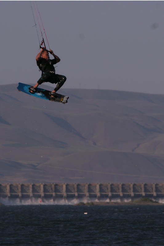 Geriatric old dude... with brace on... dangling with hands at 10 and 2 and concentrating on getting down softly...